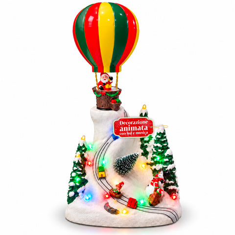 Paysage de Noël avec le père Noël volant, lumières LED et musique