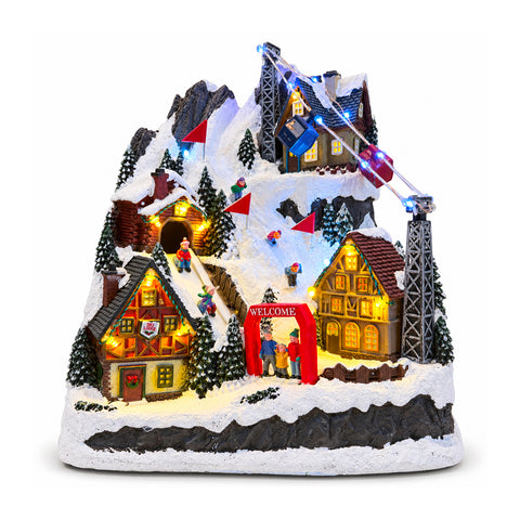 Village de Noël lumineux avec toboggan en mouvement, téléphérique, lumières LED et musique de Noël – 28x19x32 cm