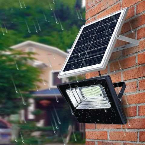 Faretto solare LED installato su parete esterna resistente alla pioggia - Illuminazione impermeabile IP66 per esterni con pannello solare integrato per risparmio energetico