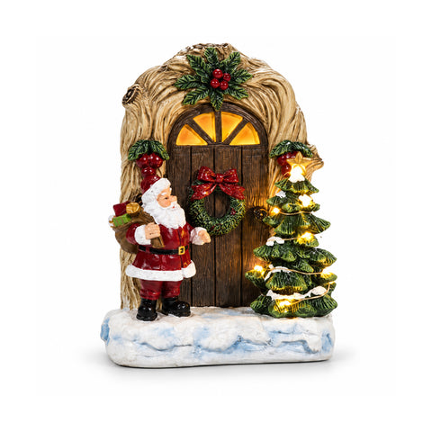 Père Noël lumineux à piles avec porte et sapin H19 cm