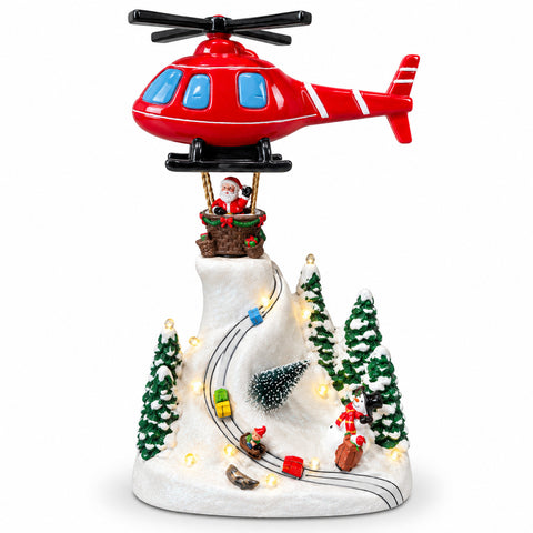 Paysage de Noël avec le père Noël volant, lumières LED et musique