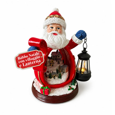 Figurine du père Noël avec village et lanterne en résine 16x19 cm