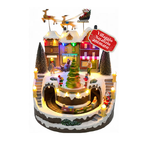 Village de Noël lumineux Xmas Town à piles avec lumières LED, musique, sapin rotatif, petit train en mouvement et traîneau du Père Noël, 27x25x34 cm