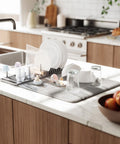 immagine-3-umbra-scolapiatti-con-tappetino-assorbigoccie-47x17x9cm-grigio-ean-028295387224