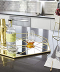immagine-6-umbra-specchio-da-parete-a-forma-di-prisma-565x425x83cm-oro-ean-028295453028