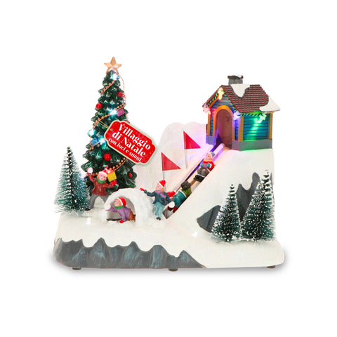 Village de Noël animé GlimmerPine avec lumières LED, musique et piste en mouvement
