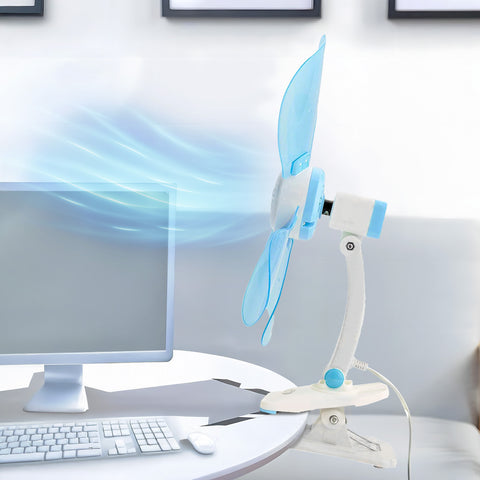 Ventilatore Kiwi in ufficio su scrivania con computer, clip di fissaggio per flusso d'aria mirato e comfort personalizzato